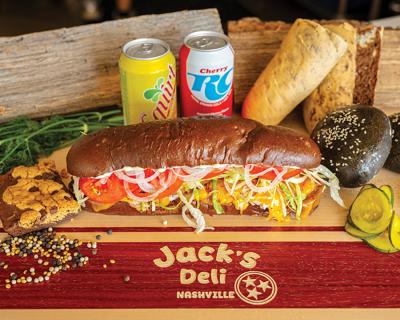 A footlong deli sub on a sandwich board at Jack's Deli