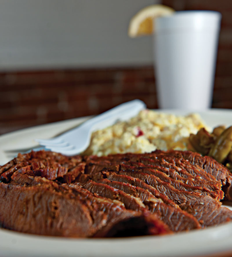 Judge Bean's brother gets the balls rolling with beef barbecue in the Gulch