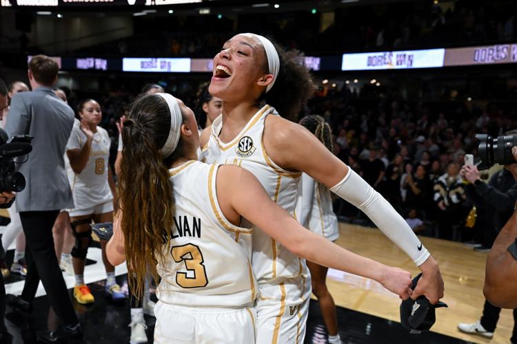 Vanderbilt's Ndjakalenga Mwenentanda Aubrey Galvan celebrate after beating the Texas Longhorns at Memorial Gymnasium, Feb. 12, 2026