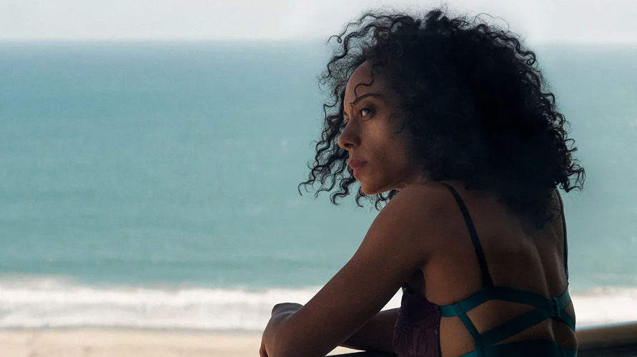 A still featuring Rosalind Eleazar near the ocean in ﻿Misty Green