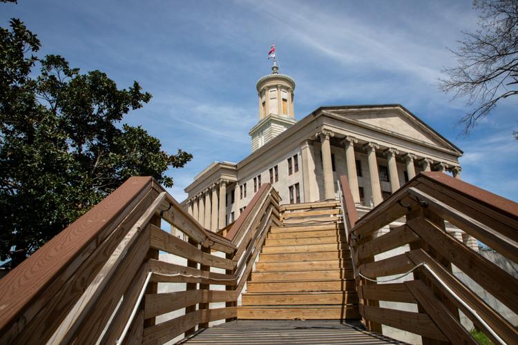 Temporary wooden stairs lead to the Tennessee State Capitol as long-term renovations continue, March 24, 2026