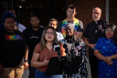 Councilmember Sandra Sepulveda, surrounded by other government and community leaders at Connection United Methodist Church, speaks against a planned ICE call center, Aug. 21, 2026