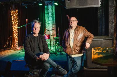 The Basement music venue co-owners Mike Grimes and Dave Brown are pictured in the audience seating at the venue.