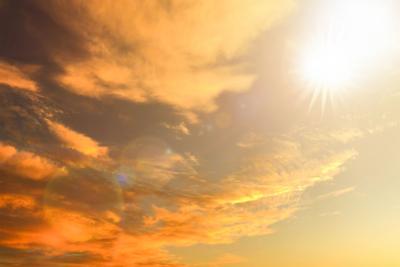 Scorching Sun Over Dramatic Sky During Extreme Heat Wave Climate Change Concept Background