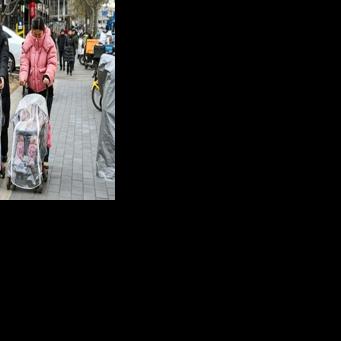 China in 2021 allowed couples to have three children -- something many, especially those living in cities, are reluctant to do 