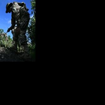 Bolivian soldiers participate in a coca crop eradication operation