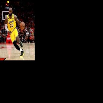 LeBron James of the Los Angeles Lakers drives to the basket against Alperen Sengun in the Lakers' victory over the Houston Rockets in game three of their NBA playoff series