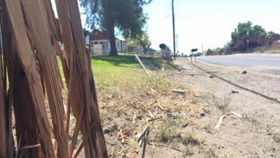 Three children injured in front yard when car crashes through fence ...
