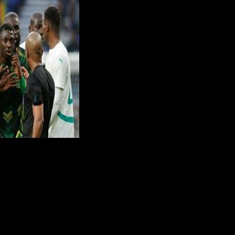 Say it ain't so: Mali's Yves Bissouma (L) gets a red card at AFCON