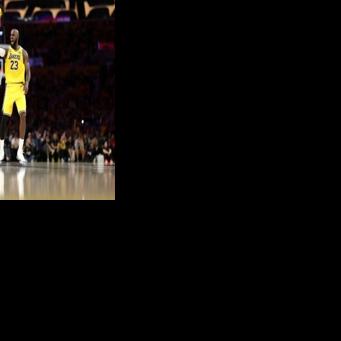 Los Angeles Lakers star LeBron James reacts after making a shot in the Lakers' win over the Houston Rockets in their NBA playoff opener