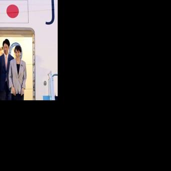 Japan's Prime Minister Sanae Takaichi (R) disembarks a plane upon arrival at Noi Bai International Airport in Hanoi on May 1, 2026.