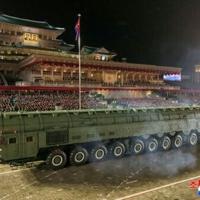 This picture taken on October 10, 2025 and released from North Korea's official Korean Central News Agency (KCNA) on October 11, 2025 shows a new intercontinental ballistic missile (ICBM) during the military parade to celebrate the 80th founding…