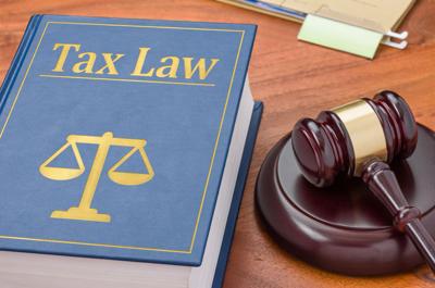 Law book with a gavel – Tax law