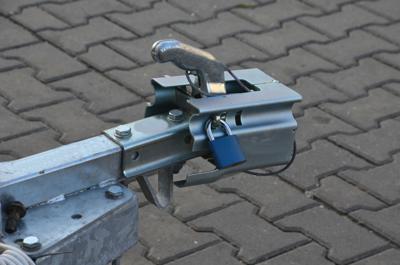 a trailer hitch metal cover with suction lock