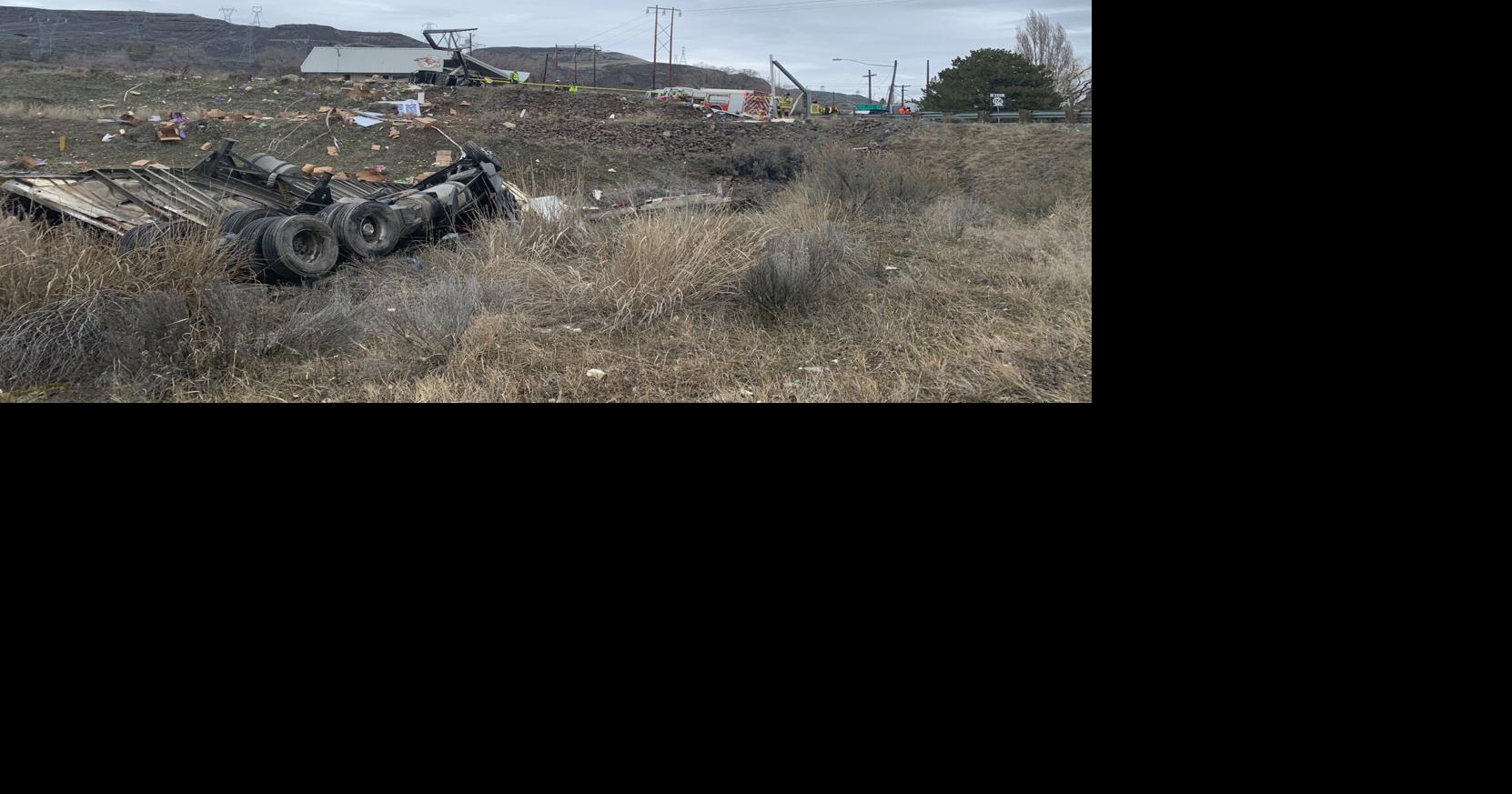 Semi crashes into car, then building in Grand Coulee News