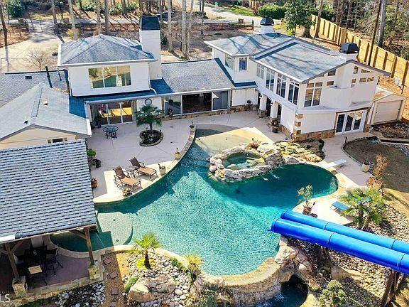 On The Market 1 2 Million Home On Lake Spivey Features 2 Water Slides Beach Access Entertainment News Daily Com