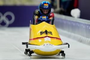 Germany's Johannes Lochner starts fast in Olympic 2-man bobsled race