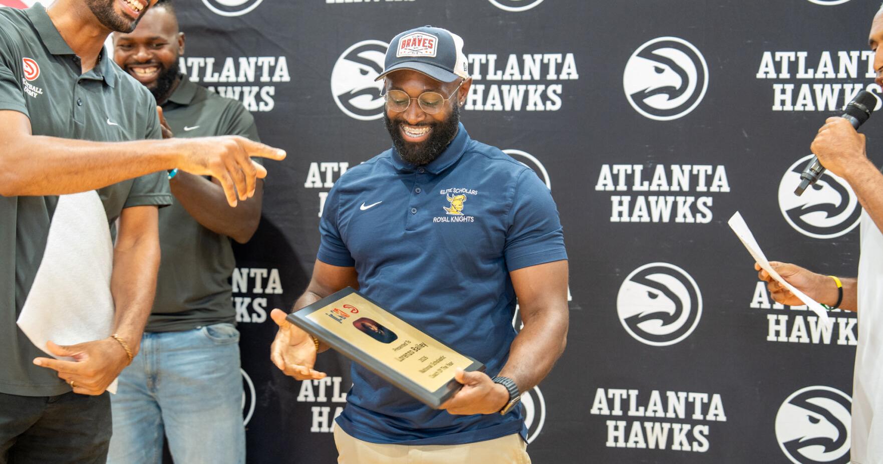 Elite Scholars Academy coach honored with national award