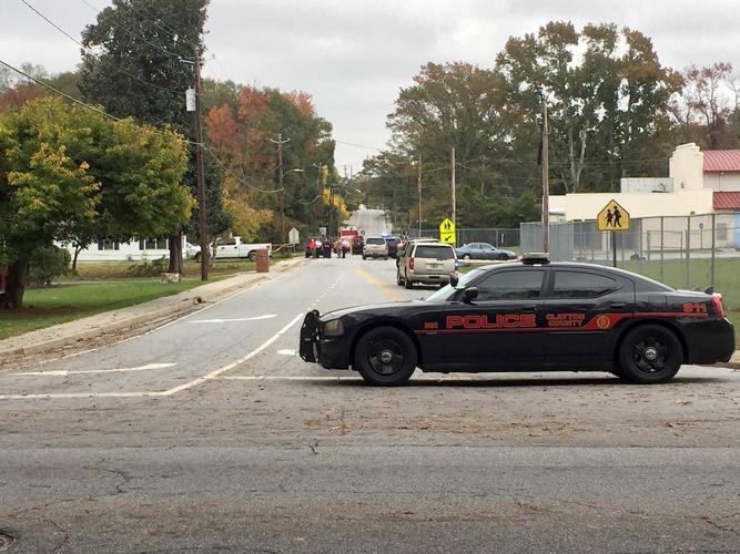 Suspect dead, two police officers injured in Forest Park shooting ...