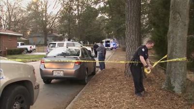 forest police park crime daily investigating homicide neighborhood yancey tapes officer drive scene found body off after