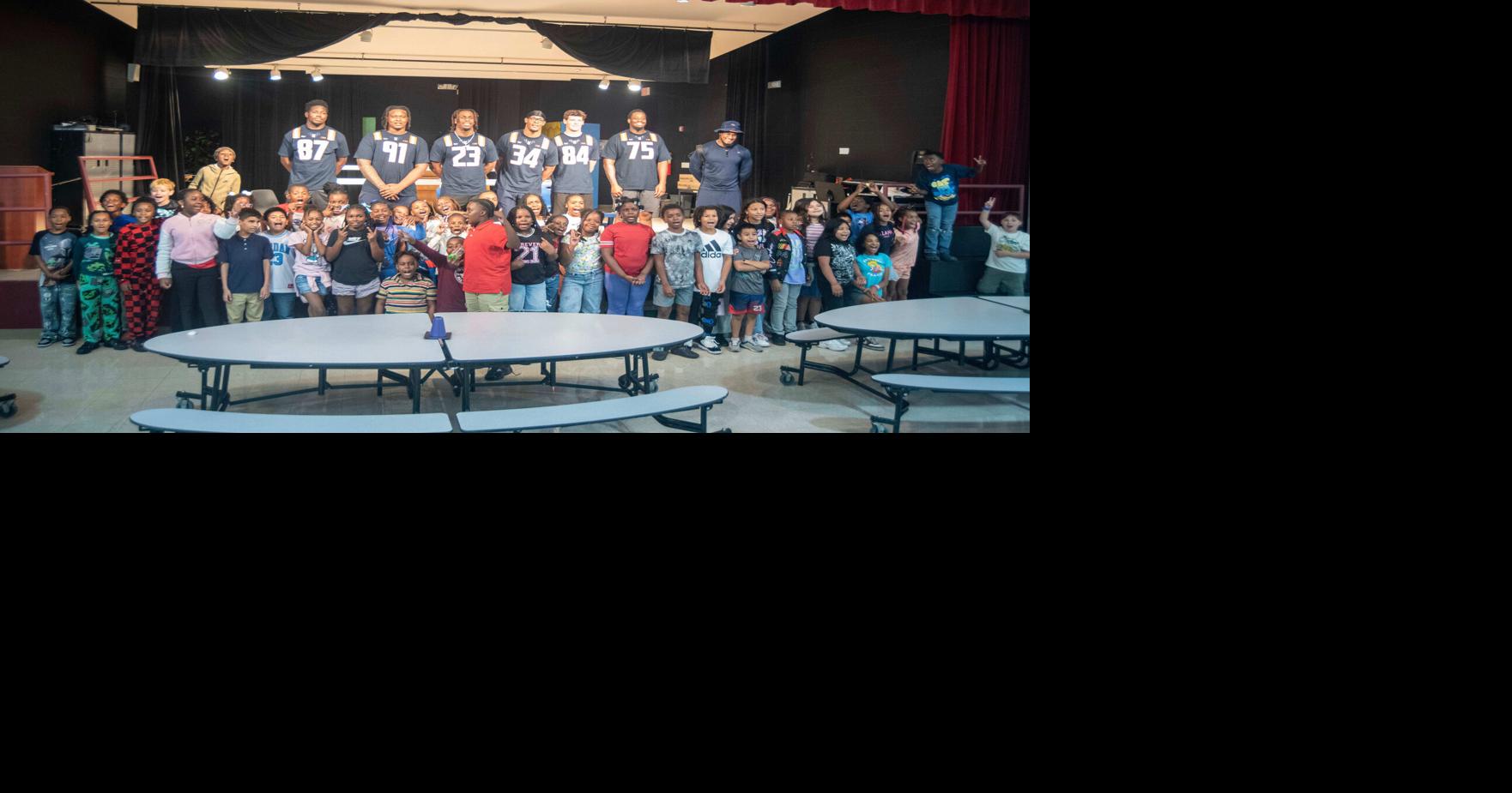 Illini football players go back to school at Champaign's Stratton ...