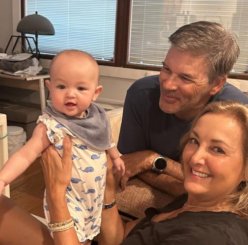 Prichards with granddaughter