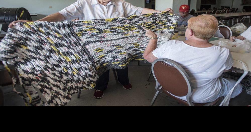 Danville group weaving plastic bags into sleeping mats for area