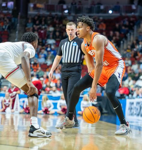 03172023-illini-mbb-shannon-dribbles-through-legs.jpg