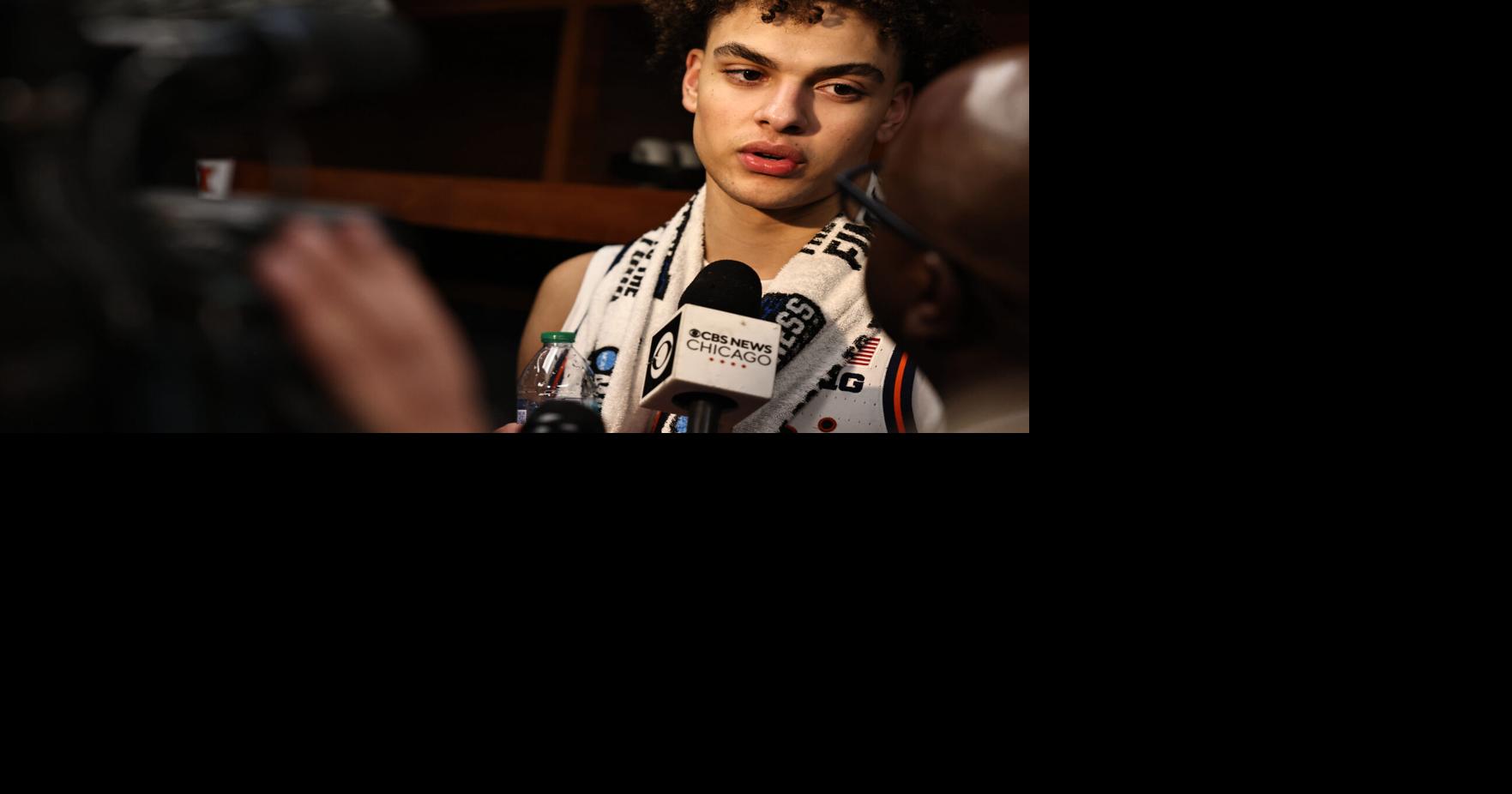 Near and far: Illini families following along in gym, from abroad