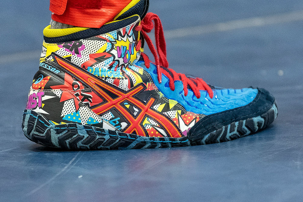 asics aggressor comic hero