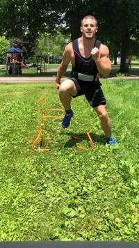 Caleb Lahey working out