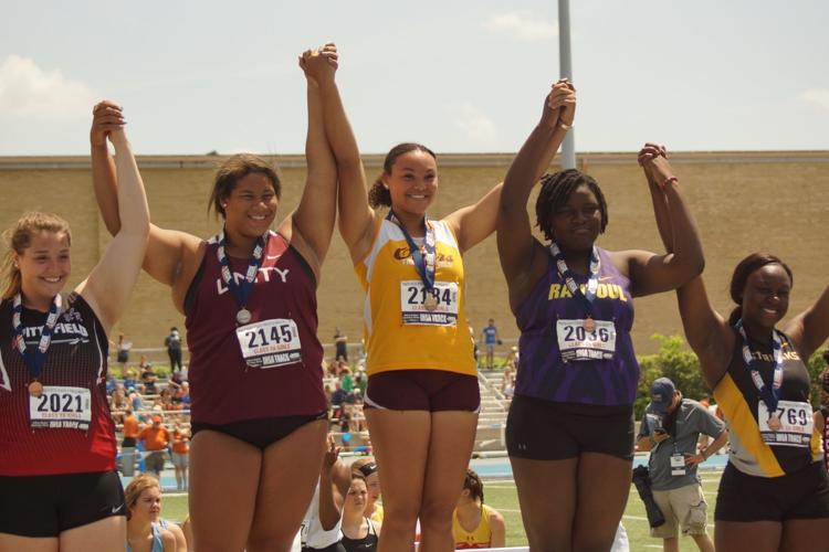 Williams placed third in the shot put, Young finished third in the long