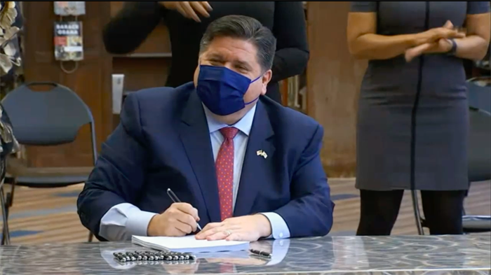 Pritzker signs health care reform measure backed