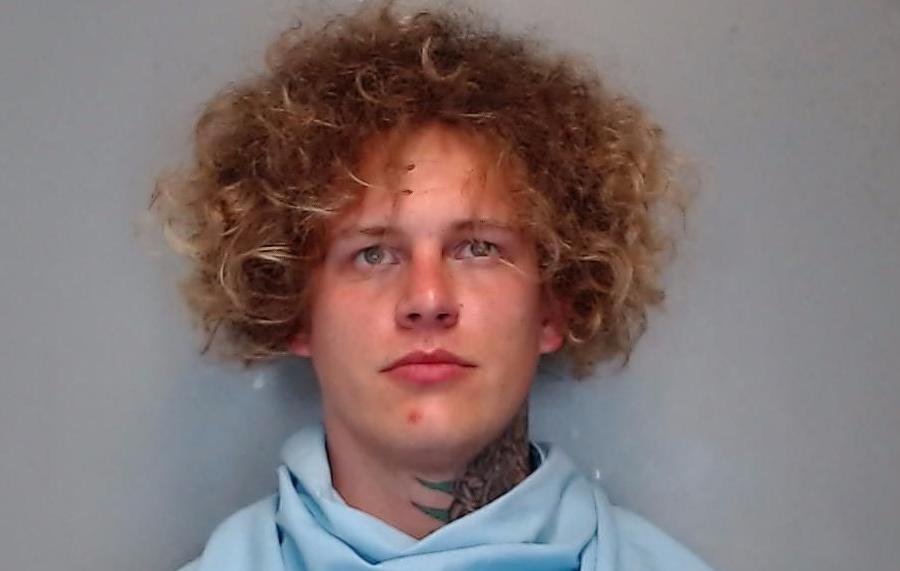 Mansfield man accused of beating cop after assault rifle, cannabis