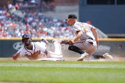 Orioles rally, halt Cubs' 5-game winning streak