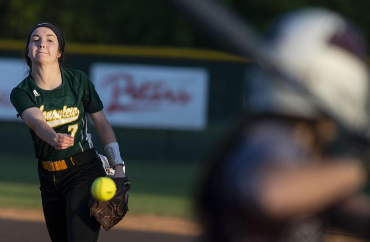 High school softball: Purcell outlasts Washington in 14-inning