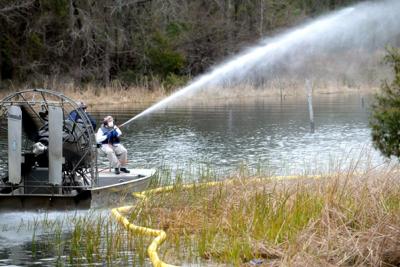 SWEPCO cleans up, renovates reservoir boat ramp area