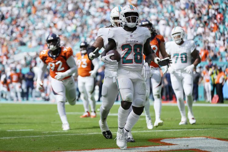 Dolphins score 70 in win over Broncos, Sports