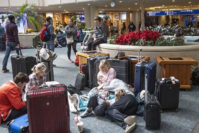 US-NEWS-WEA-FLIGHT-CANCELLATIONS-OS