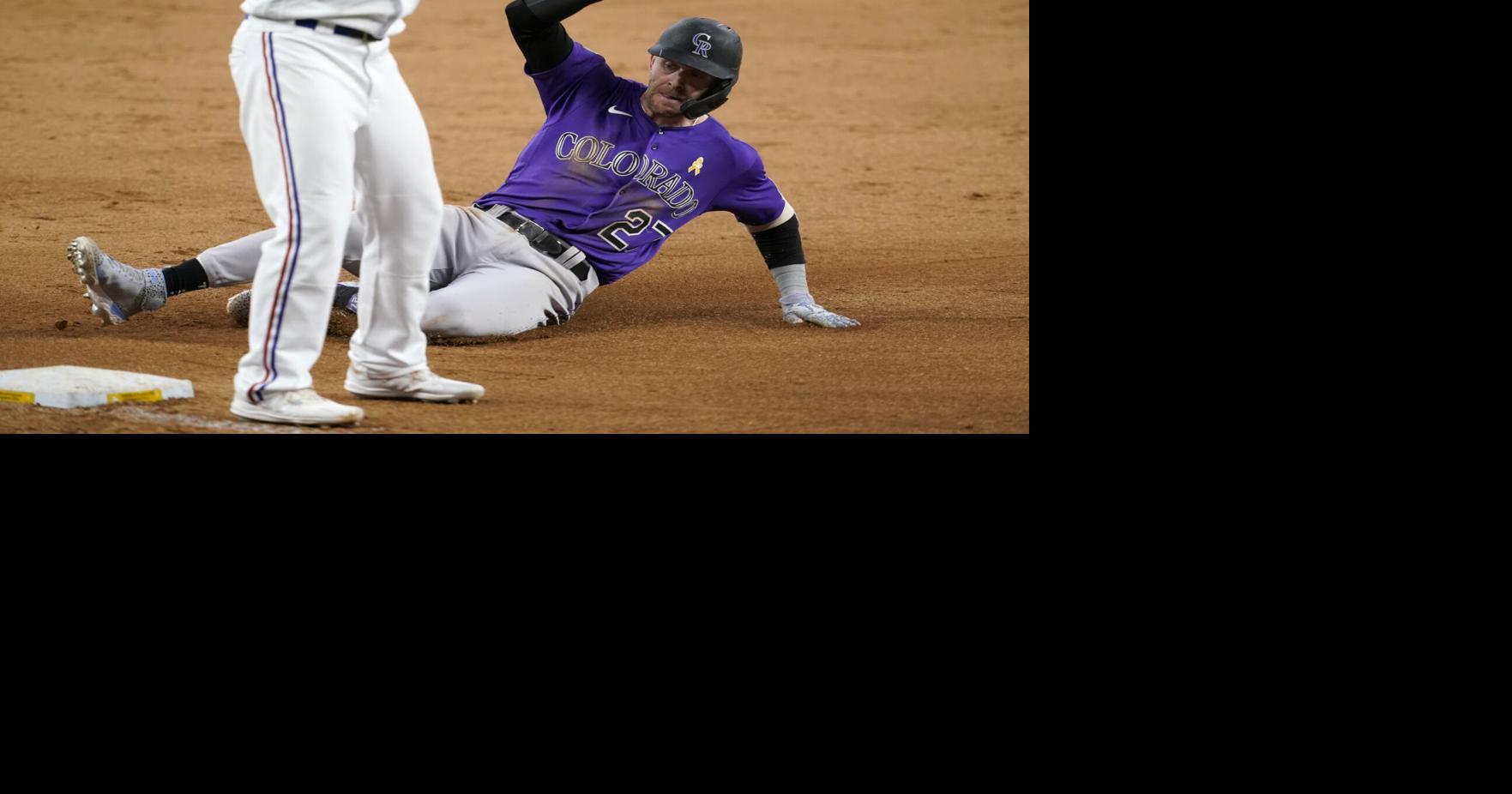 Rockies fall behind early, score 5 in 9th to beat Rangers