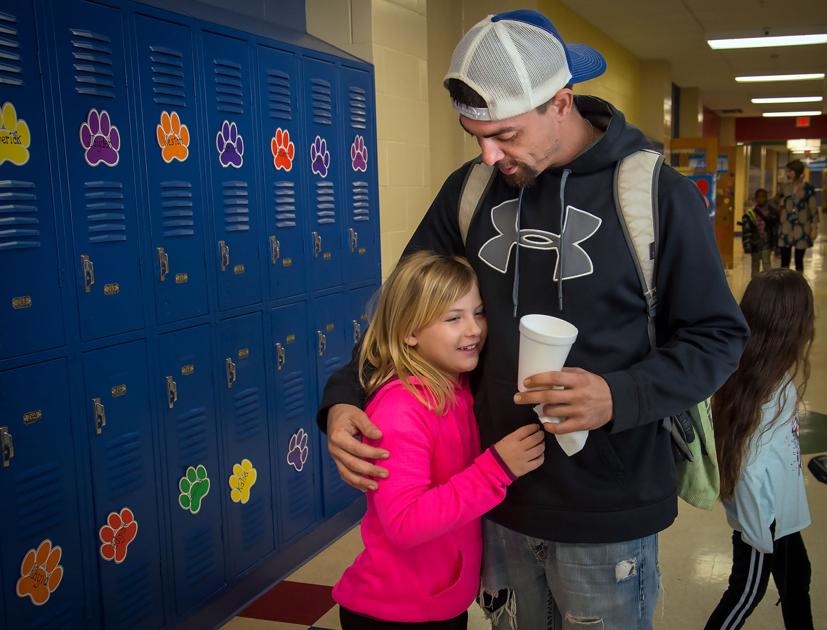 Donuts with Daughters connects parents, students at Spring Hill Intermediate School