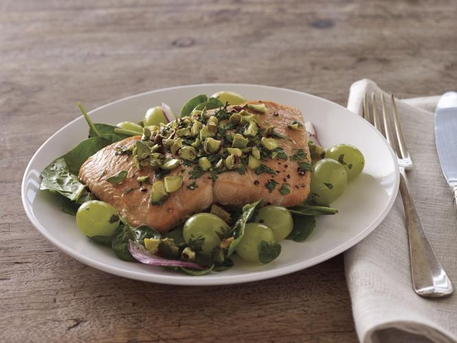 Roasted Salmon and Grapes with Pistachios Over Fresh Greens