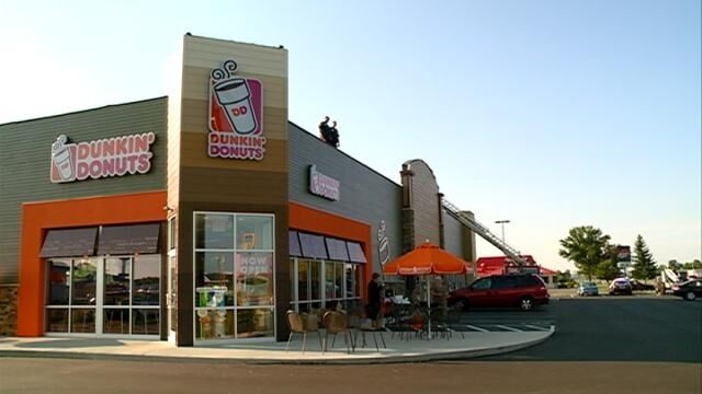 Tomah police stand on roof of Dunkin Donuts for good cause