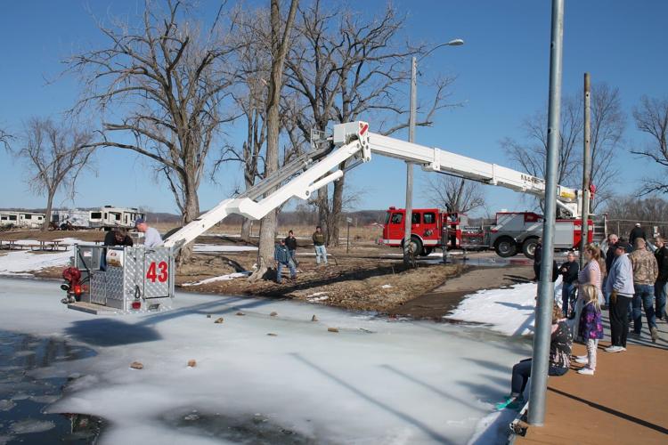 Prairie du Chien firefighters save dog and get plenty of kisses in