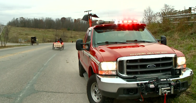 Driver of grain truck transported to hospital after single vehicle accident