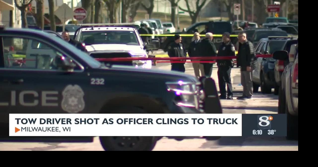 Tow Driver Shot as Officer Clings to Truck | News | news8000.com