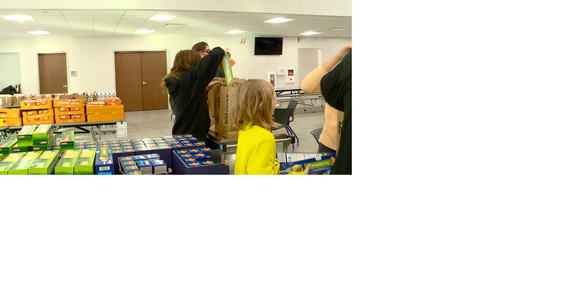 Onalaska teachers support families with holiday food basket distribution