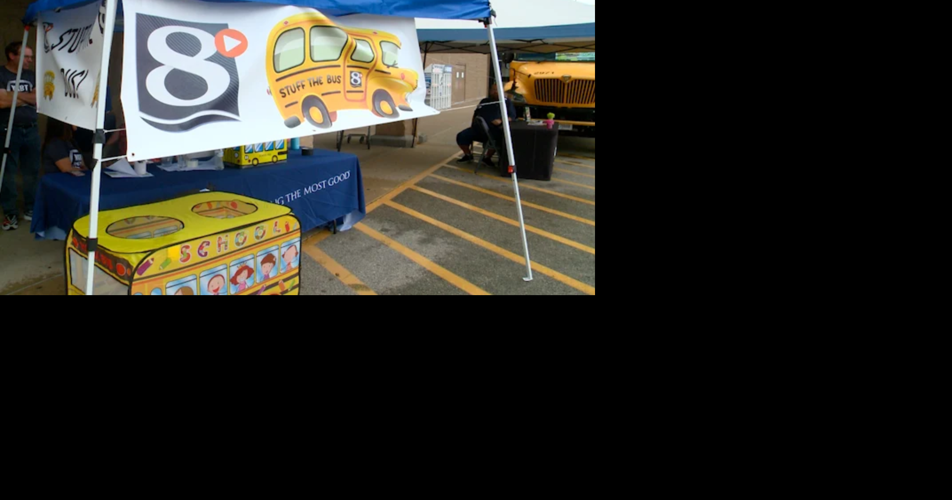 Community unites for students in need at "Stuff The Bus" event