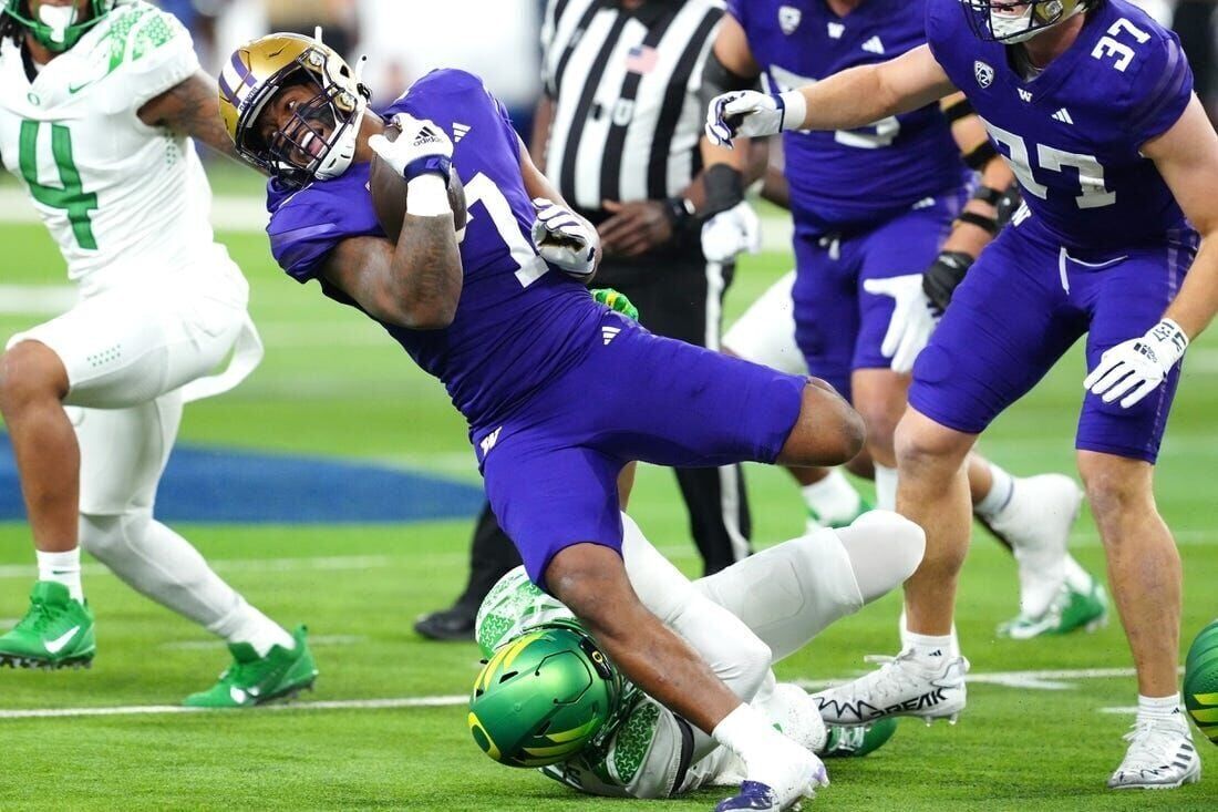 No. 3 Washington tops No. 5 Oregon again, seals CFP bid