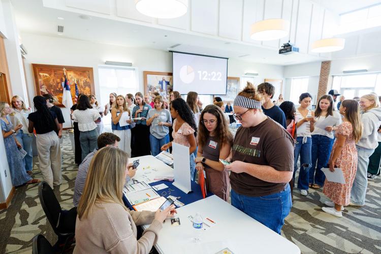 FACS students learn about challenges facing poverty-stricken families during simulation event